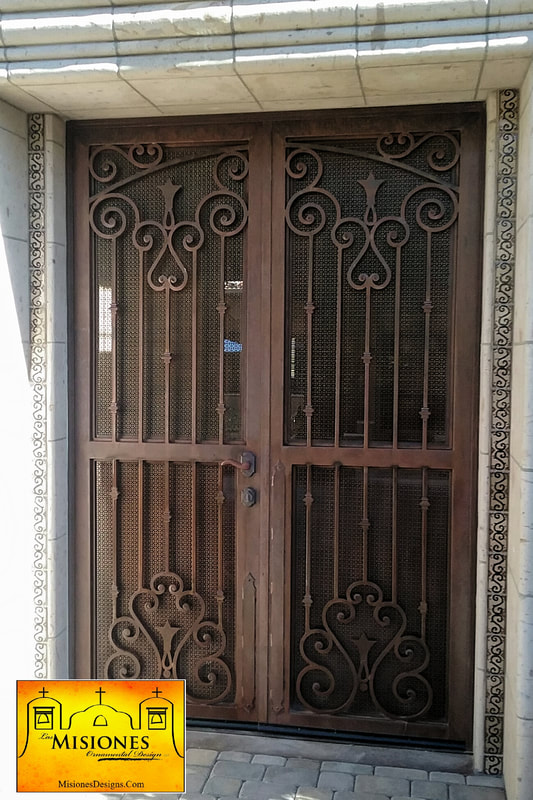 rust colored double door, scrolls with bars, steel metal courtyard gate