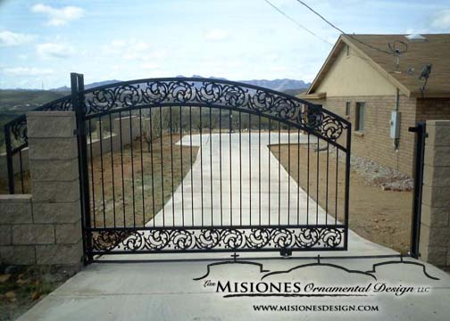 black rolling driveway gate