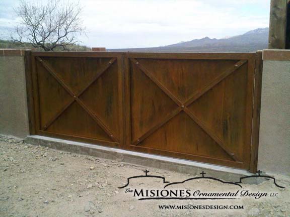 double driveway gate, solid plate with large criss cross bars on each panel