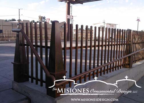 nogales az city-fencing farmer's market area, rust coloring, vase shaped pillars with vertical bar paneling