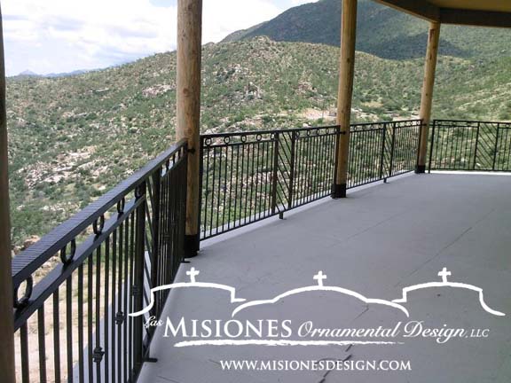 outdoor railing for second floor porch, black paneling with vertical balusters and steel ring designs