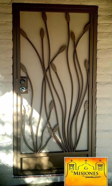 screen door with decorative ocotillo plants, includes kickplate, in a brown finish