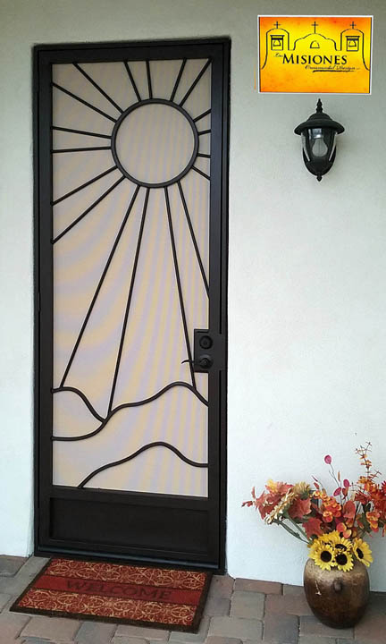 security screen door with mountain desert scene and sun, includes kickplate, in a black finish