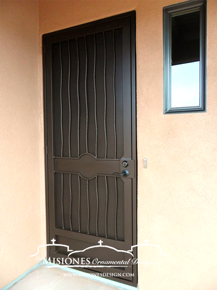 security screen door with basic design, vertical bars and plain band, includes kickplate, in a brown finish