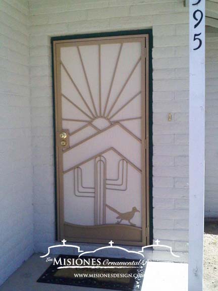 security screen door with a mountain desert sunset scene including a cactus and roadrunner, in a tan finish 