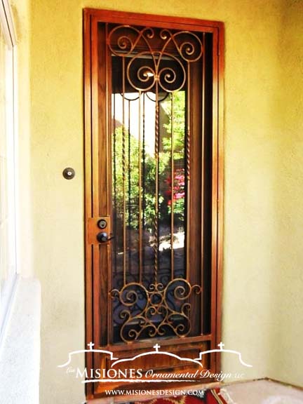 security screen door with scrolls and vertical bars, in a glossy rust finish