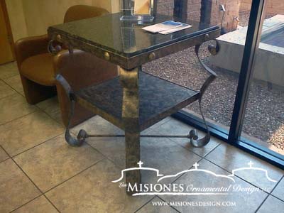 square two tier metal table, four flat bar legs on the corners, shaped in romantic style, tops are glass or granite